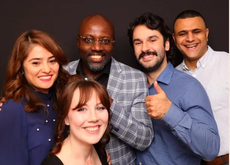 Photo-booth picture of Adnan and friends at a Sonder Coworking & Events gathering